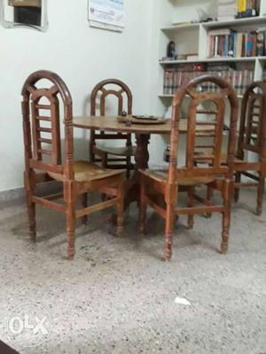 Teak wood dinning table with four chairs