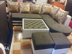Tufted Gray And White Sectional Sofa And Ottoman Set