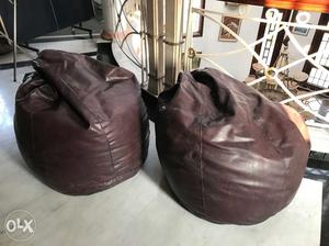 Two Brown Leather Bean Bags