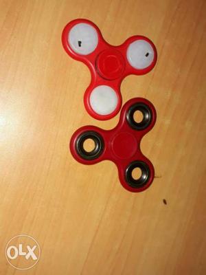 Two Red Hand Spinners