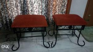 Two Red-and-black Metal Frame Padded Footstools