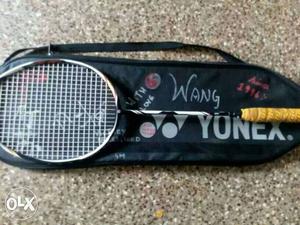 White And Black Yonex Badminton Racket