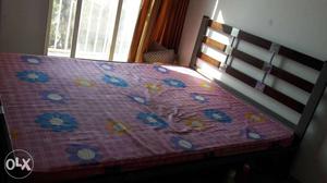 Wooden bed with dreamline matress