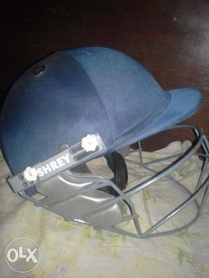 A cricket helmet of shrey brand medium size blue