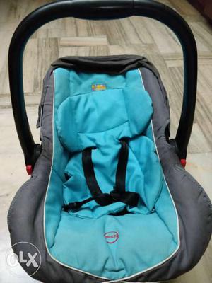 Baby's Blue And Gray Carrier Car Seat