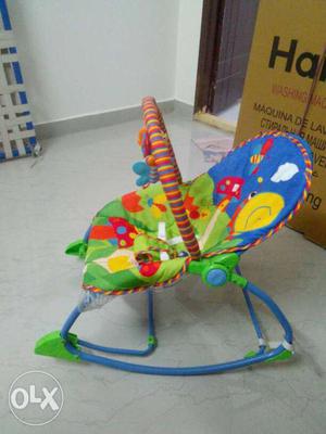 Baby's Blue And Green Animal Printed Bouncer Chair
