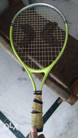 Brown And Green Tennis Racket