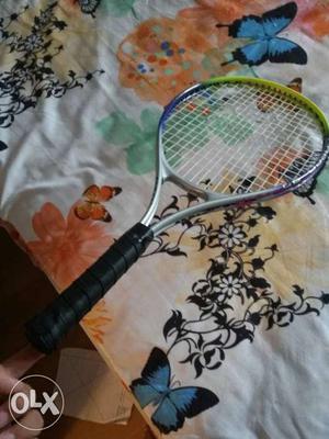 Gray And Green Tennis Racket