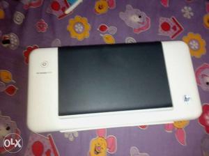 It is a HP Deskjet printer with a power cord and