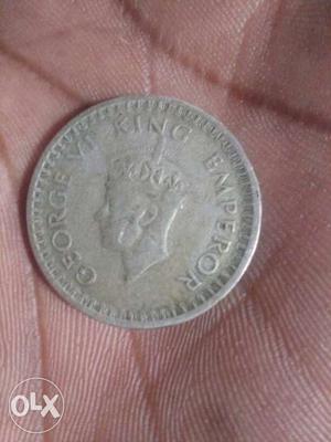 Old Indian coin half rupee.