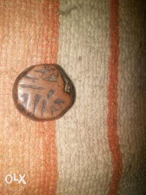 One Round Bronze Vintage Coin