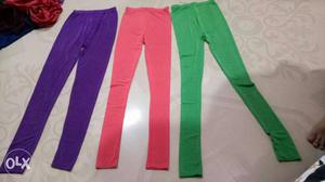 Three Purple, Pink, And Green Pants