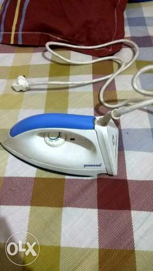 White And Blue Corded Clothes Flat Iron