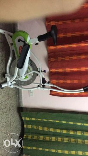White And Green Elliptical Trainer