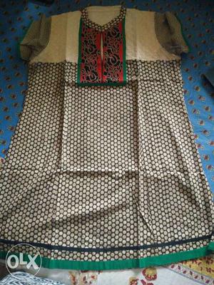 A cotton kurti xl in size with embroidery in the