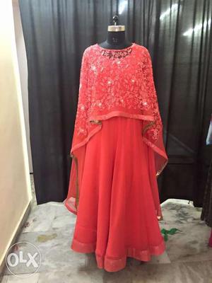 Beautiful gown with long cape to make you look