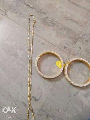 Brand new gold covering. both bangle and chain 500rs only