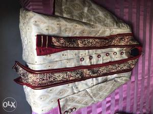 Manyavar Off white sherwani with red shawl worn only once.