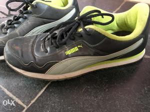 Pair Of Black And Green Puma Snoes