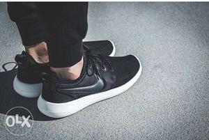 Pair Of Black Nike Sneaker