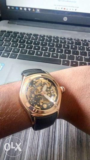 Round Gold Skeleton Watch With Rubber Strap