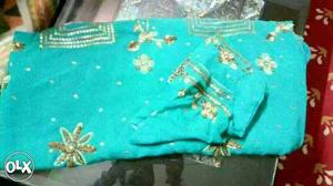 Teal And White Floral Textile