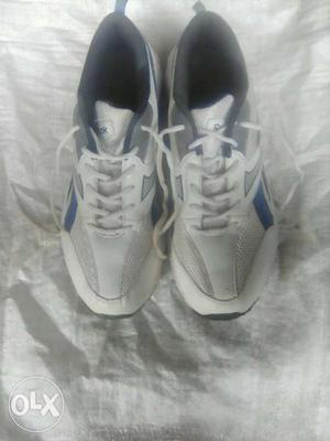 White And Blue Leather Running Shoes