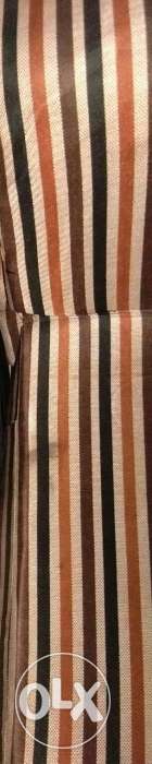 Beige And Black Striped Textile