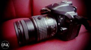 Black Nikon DSLR Camera D With Zoom Lens and VR kit lens