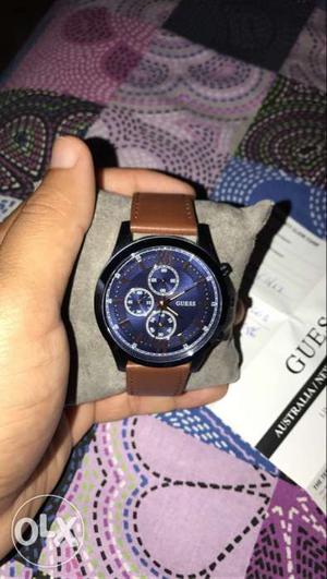 Black Round Chronograph Watch With Brown Leather Strap