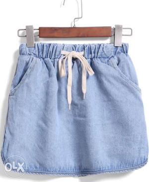 Blue drawstring waist denim skirt. Smart, short &
