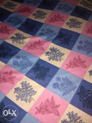Blue,pink And White Textile
