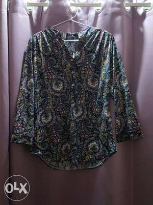 Brand new imported paisley print tunic. Stretch
