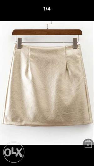 Gold side zipper party skirt. Short & smart.
