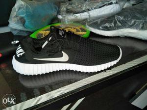 Paired Black And White Nike Shoe