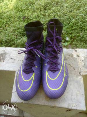 Purple-and-white Nike Cleats