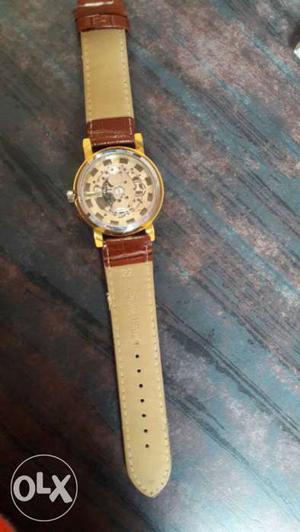 Round Beige Chronograph Watch With Brown Leather Strap