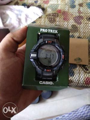 Round Black Casio Protrek Digital Watch With Link Band And