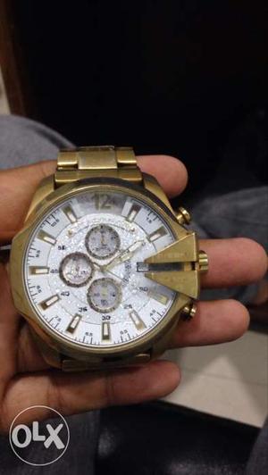 Round White And Gold Chronograph Watch