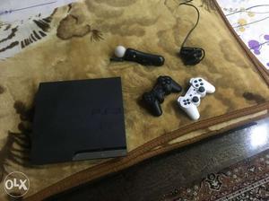 Sony ps 3 with 2 dual shock remotes joystick and