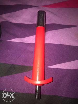 Stainless Steel And Red Handheld Tool