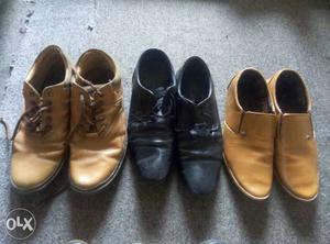 Three Pair Of Black And Brown Leather Shoes