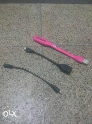 Three Pink And Black USB Cables