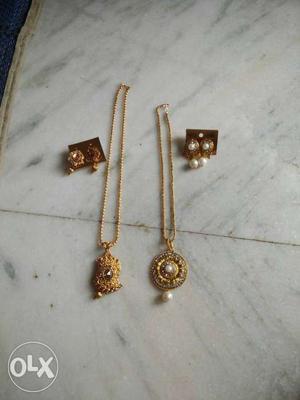 Two Gold Pendant Necklaces