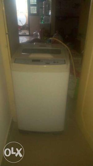 White And Beige Top-load Washing Machine not used