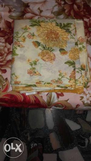 White And Yellow Floral Textile