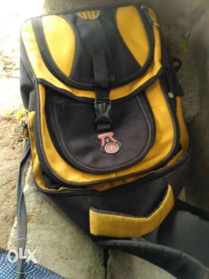 Yellow And Black Zip Backpack