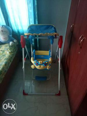 Baby's Yellow And Blue Indoor Mobile Swing