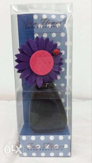 Black, Reed, And Purple Sun Flower Perfume Bottle In Box
