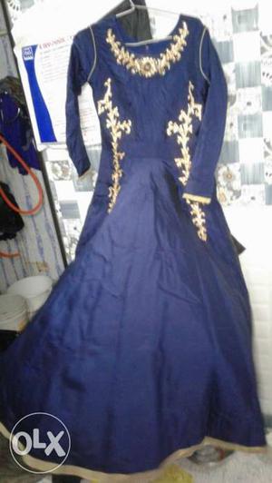 Blue gown with chudidaae and net dupatta wore 1